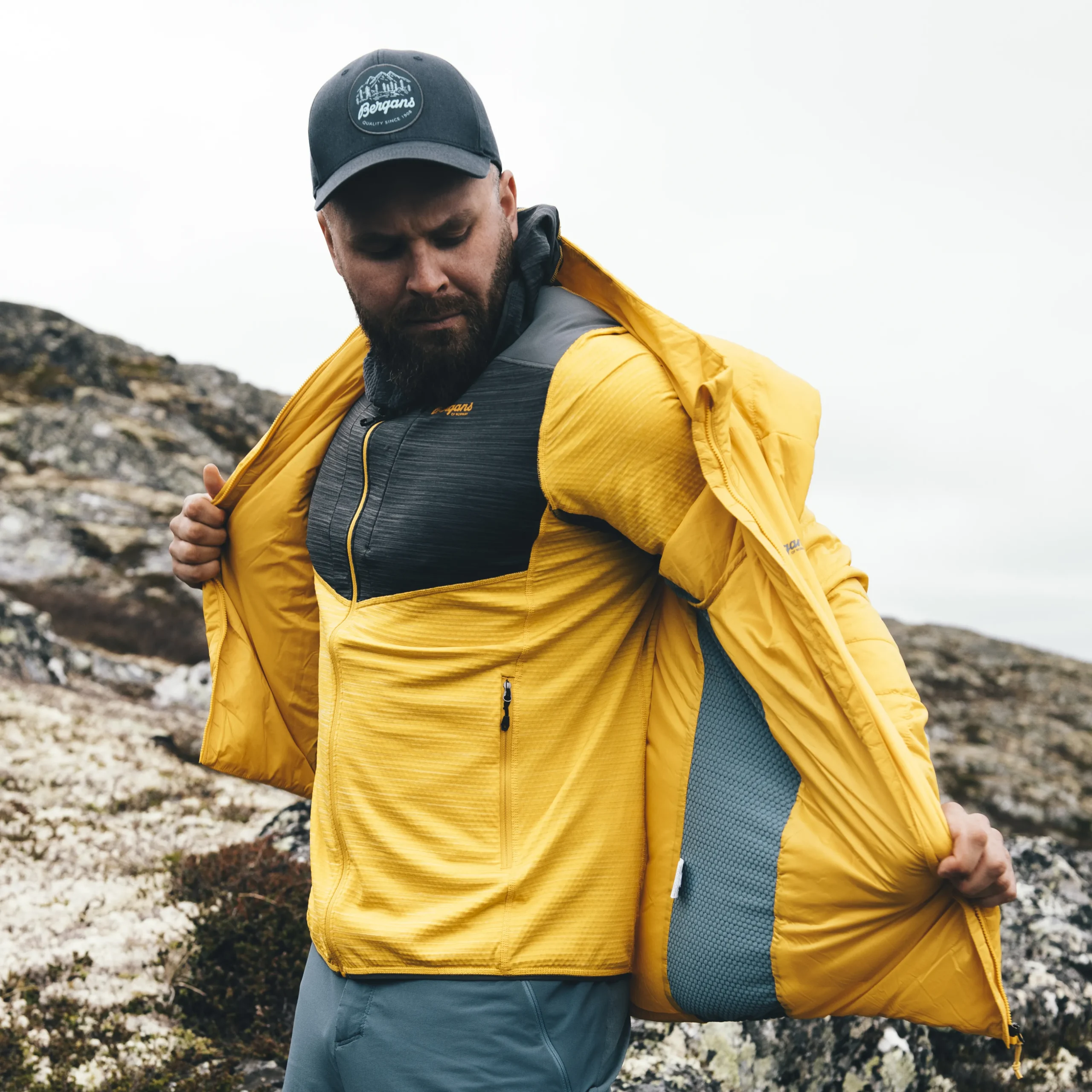Shop Bergans Rabot Active Mid Hood Jacket - Light Golden Yellow / Solid Charcoal